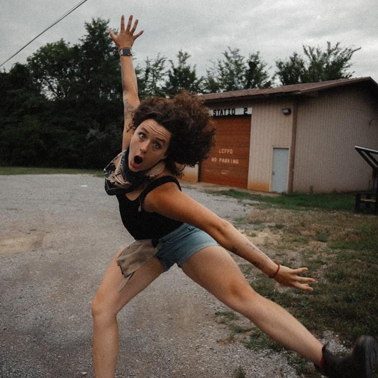 Kaveri Mehta, Lead Design Curator at Trail Core Gallery, reviewing corporate floral arrangements